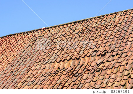 clay tile roof damage, some fallen tiles 82267191