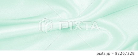 Smooth elegant green silk or satin luxury cloth texture as abstract background. Luxurious background design Smooth elegant green silk or satin luxury cloth texture as abstract background. Luxurious background design 82267229