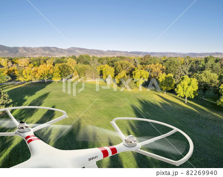 drone flying over park drone flying over park 82269940