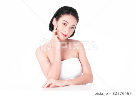 Beautiful young asian woman with clean fresh skin on white background, Face care, Facial treatment, 82276467