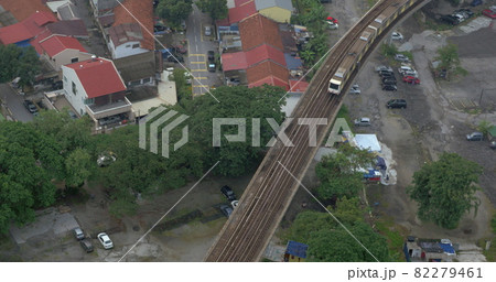 Bird eye view of poor district and riding train on railways Bangkok, Thailand Bird eye view of poor district and riding train on railways Bangkok, Thailand 82279461