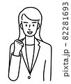 こぶしを握ってやる気を示す、スーツを着た若い女性の上半身（線） 82281693