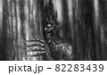 Scary mister Halloween looks out from behind tree in dark forest. Gloomy evil demon. Spooky 2d illustration. 82283439
