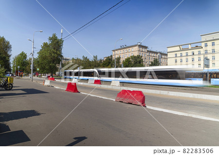 Modern tram on a Moscow street, Russia. To obtain a blur effect,an ND2 up to ND400 filter with adjustable neutral density is used. No other changes were made Modern tram on a Moscow street, Russia. To obtain a blur effect,an ND2 up to ND400 filter with adjustable neutral density is used. No other changes were made 82283506