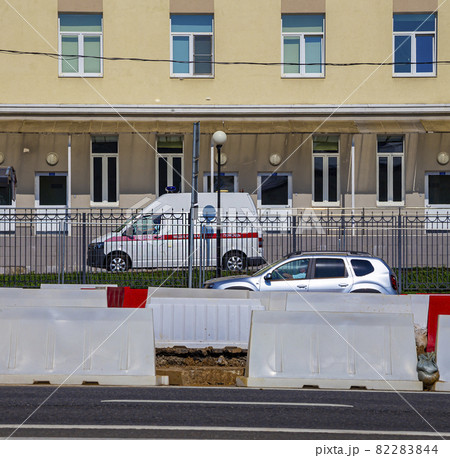 Ambulance car on the street in city (summer sunny day). Side view. Residential area. Moscow, Russia 82283844