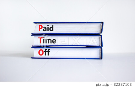 PTO, Paid time off symbol. Books with concept words 'PTO, Paid time off'. Beautiful white background, copy space. Business and PTO, paid time off concept. 82287108