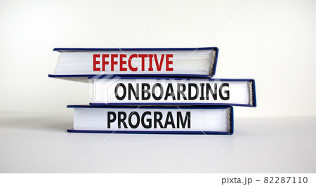 Effective onboarding program symbol. Books with words 'effective onboarding program' on beautiful white background. Business and effective onboarding program concept. Copy space. Effective onboarding program symbol. Books with words 'effective onboarding program' on beautiful white background. Business and effective onboarding program concept. Copy space. 82287110