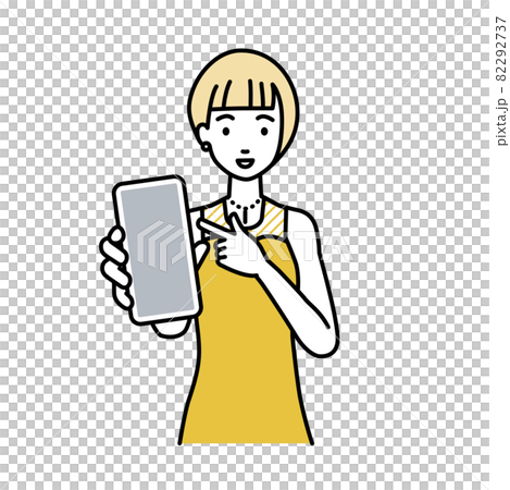 立ってスマートフォンを指差してこちらに向けて見せているドレスの女性 立ってスマートフォンを指差してこちらに向けて見せているドレスの女性 82292737