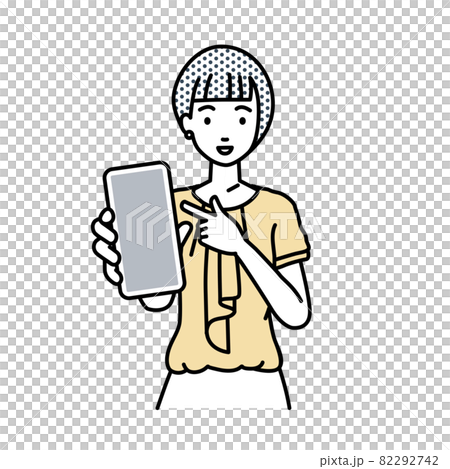 立ってスマートフォンを指差してこちらに向けて見せているオフィスカジュアルの女性 82292742