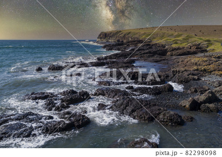 Drone aerial photograph of cows grazing at the coastal path inlet at Kiama 82298098