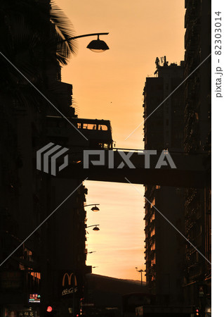 the sunset at street through Midtown Shek Tong Tsui, hk 23 Aug 2021 the sunset at street through Midtown Shek Tong Tsui, hk 23 Aug 2021 82303014