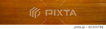 木目のある横長のミディアムブラウンの板材の背景画像2 82303788