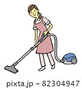 掃除機をかける若い女性 82304947