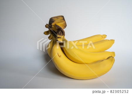 Several ripe bananas, some of which have been carved 82305252