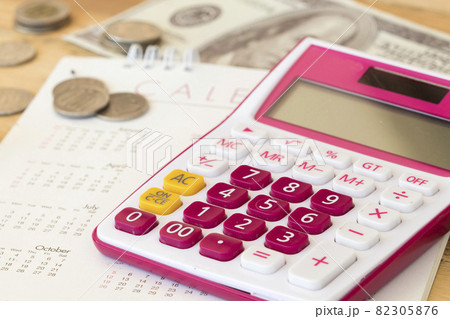 calculator, calendar and money for business of lifetyle arrangement flat lay style 82305876