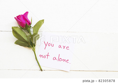 you are not alone message card handwring with pink rose flowers  82305878