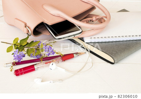notebook planner, mobile phone for business work with pink bag of lifestyle woman 82306010