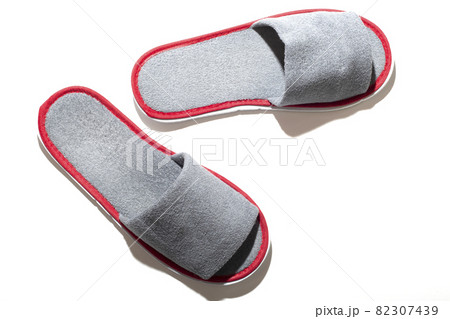 Gray one-off slippers for hotel on a white background 82307439