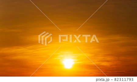 The rising sun on the orange sky and the faded clouds, natural scenery 82311793