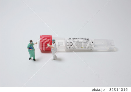 a figure of doctor with the collection tubes a figure of doctor with the collection tubes 82314016