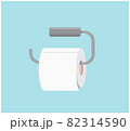 a roll of toilet paper hanging on a metal hanger on a blue wall background  82314590