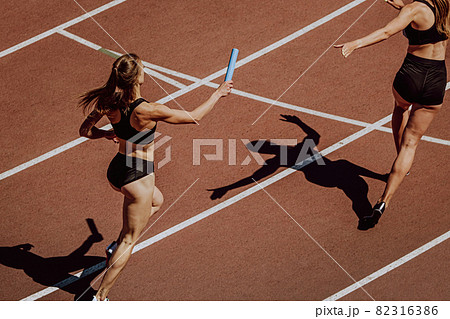 women relay race running 82316386