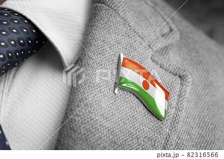 Metal badge with the flag of Niger on a suit lapel Metal badge with the flag of Niger on a suit lapel 82316566