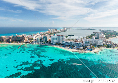 Aerial panoramic view of Cancun beach and city hotel zone in Mexico. Caribbean coast landscape of Mexican resort with beach Playa Caracol and Kukulcan road. Riviera Maya in Quintana roo region on 82321537
