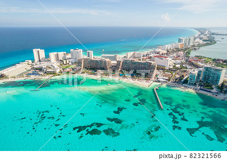 Aerial panoramic view of Cancun beach and city hotel zone in Mexico. Caribbean coast landscape of Mexican resort with beach Playa Caracol and Kukulcan road. Riviera Maya in Quintana roo region on 82321566