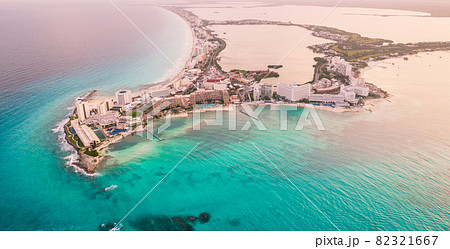 Aerial panoramic view of Cancun beach and city hotel zone in Mexico. Caribbean coast landscape of Mexican resort with beach Playa Caracol and Kukulcan road. Riviera Maya in Quintana roo region on 82321667