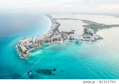 Aerial panoramic view of Cancun beach and city hotel zone in Mexico. Caribbean coast landscape of Mexican resort with beach Playa Caracol and Kukulcan road. Riviera Maya in Quintana roo region on 82321701