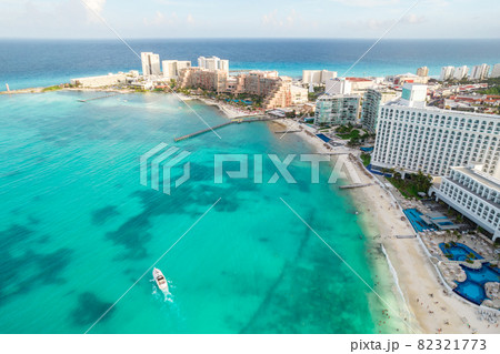 Aerial panoramic view of Cancun beach and city hotel zone in Mexico. Caribbean coast landscape of Mexican resort with beach Playa Caracol and Kukulcan road. Riviera Maya in Quintana roo region on 82321773