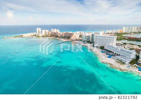 Aerial panoramic view of Cancun beach and city hotel zone in Mexico. Caribbean coast landscape of Mexican resort with beach Playa Caracol and Kukulcan road. Riviera Maya in Quintana roo region on 82321792