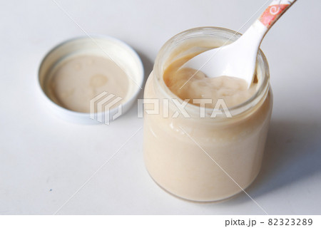 baby food in a container on table with copy space. 82323289