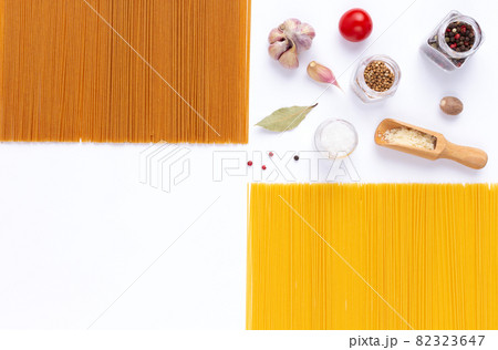 Raw pasta spaghetti and ingredients food at white background. Pasta recipe concept 82323647