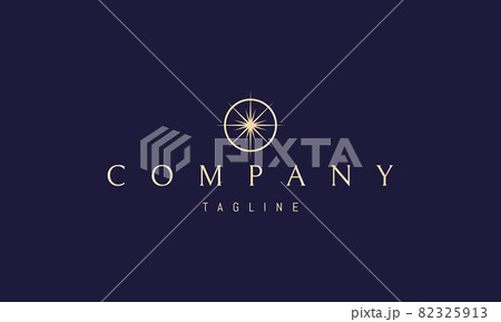 Vector golden logo on which an abstract image of a bright star in a circle in the form of a compass. 82325913