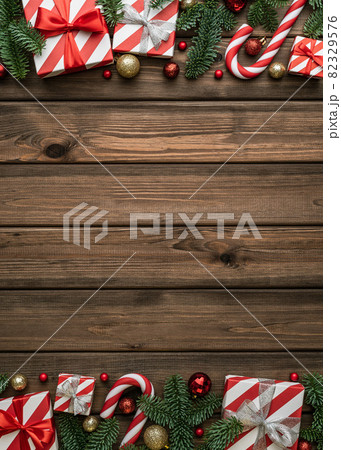 Christmas background with gift boxes and decorations on vintage background Christmas background with gift boxes and decorations on vintage background 82329576