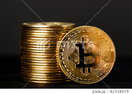 Close up shot of Bitcoin coins on black background,  A pile of Bitcoin Cryptocurrency Gold Bitcoin BTC Bit Coin.  Digital blockchain technology, bitcoin mining concept 82338079