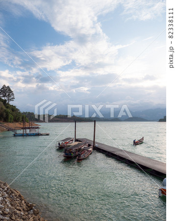 Scenic landscape of big river and reservoir dam with mountain and nature forest 82338111