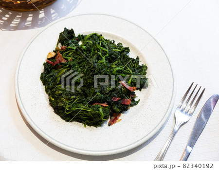 Catalan Spinach served on table Catalan Spinach served on table 82340192