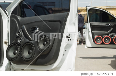 car with a large number of installed audio speakers and subwoofer car with a large number of installed audio speakers and subwoofer 82345314