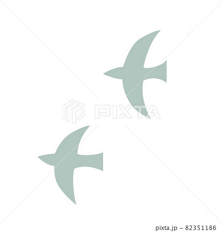 空を飛ぶ二羽の鳥のシルエットのイラスト素材