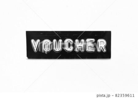 Black color banner that have embossed letter with word voucher on white paper background Black color banner that have embossed letter with word voucher on white paper background 82359611