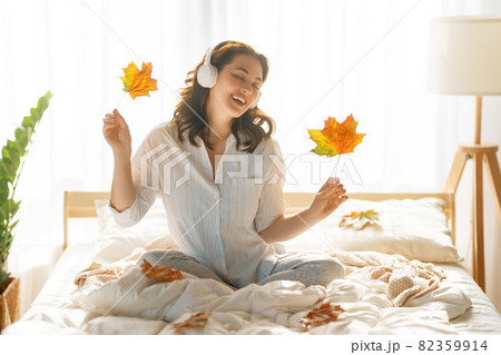 woman enjoying sunny morning woman enjoying sunny morning 82359914