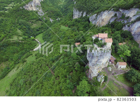 Katskhi pillar and the Orthodox Church on it, filmed in Georgia, from the air quadrocopters Katskhi pillar and the Orthodox Church on it, filmed in Georgia, from the air quadrocopters 82363503