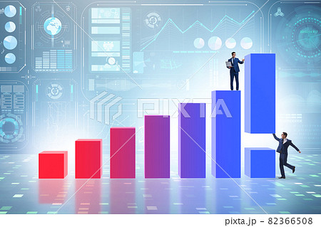 Businessman supporting economic growth on chart Businessman supporting economic growth on chart 82366508