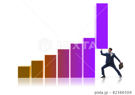 Businessman supporting economic growth on chart Businessman supporting economic growth on chart 82366509