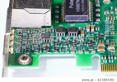 Old Printed Circuit Board with many electrical components. Old Printed Circuit Board with many electrical components. 82366590