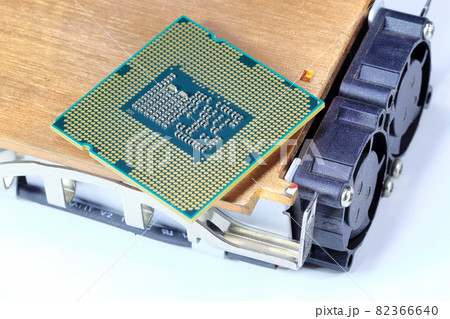Close up Hight performance CPU with active Aluminum and copper heatsink isolated on white background. Close up Hight performance CPU with active Aluminum and copper heatsink isolated on white background. 82366640