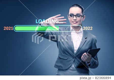 Businesswoman pressing virtual button with year 2022 Businesswoman pressing virtual button with year 2022 82366894